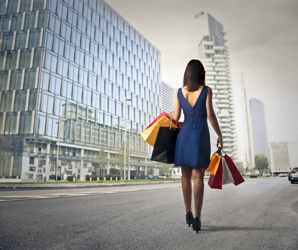 Woman shopping carrying lots of bags